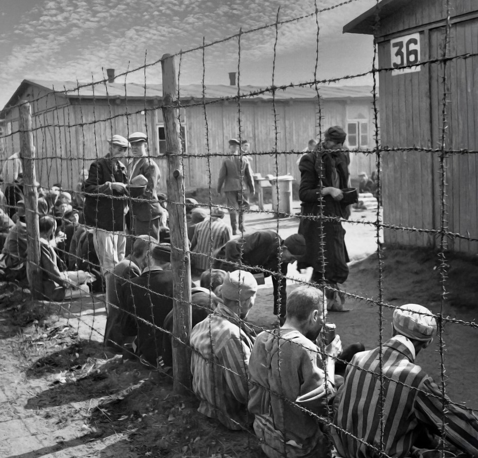 Bergen-Belsen concentration camp prisoners eating after liberation.