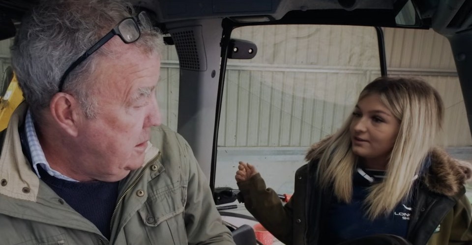 Jeremy Clarkson and his farmhand Harriet Cowan in a tractor.