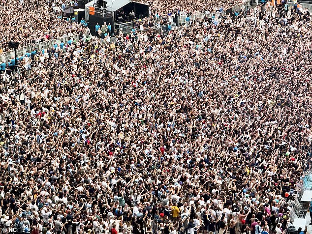Two tipsters claimed a large group of fans were able to all use a copy of the same ticket to get into the North London stadium through a disabled entrance. Pictured: The first night of Oasis playing at Wembley stadium in London