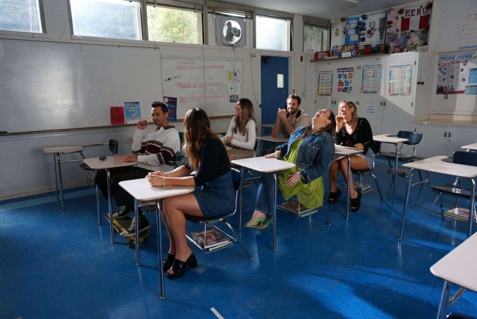 Laguna Beach cast members reunited in a classroom.