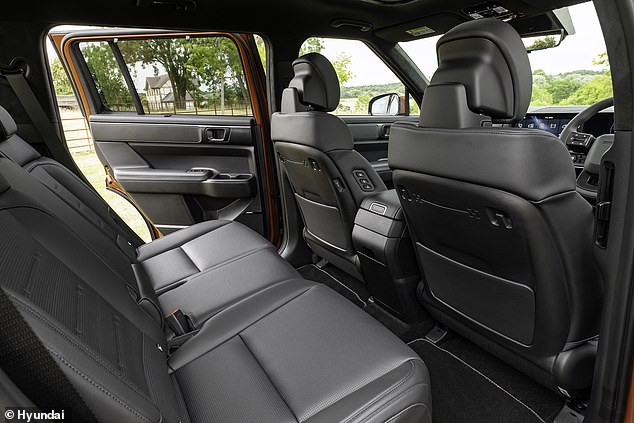 The square shaped doors open wide to provide easy entry and exit to the vehicle. The large rectangular wheels also allow plenty of light into this enormous seven-seat motor