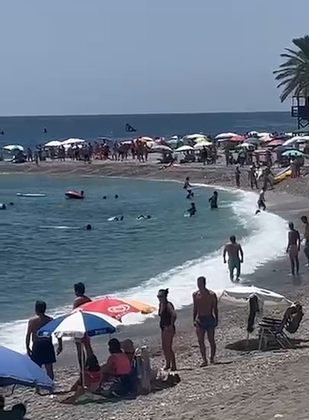 As the unwelcome visitors from north Africa tried to make a run for it, they were rugby tackled to the ground by ordinary holidaymakers in swimming trunks