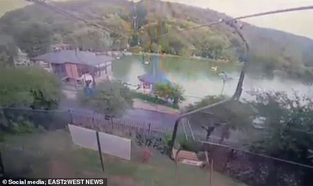 Footage shows how the moment the chairs suddenly fall, with passengers plunging into the lake below