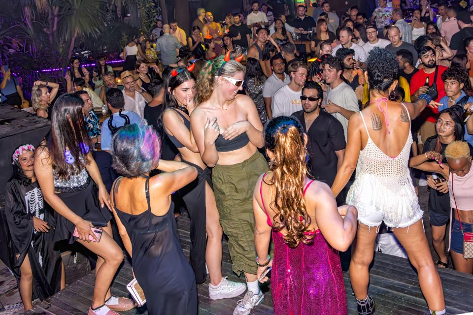 Dancers at a Halloween party.