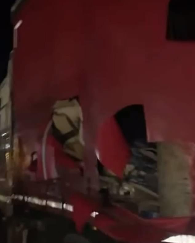 The container of a lorry is left ripped open after a gang of thieves tried to steal its load