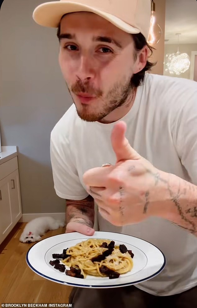 His latest post comes just hours after he appeared to extend a tentative olive branch to son Brooklyn, 26, by 'liking' his latest video on Instagram