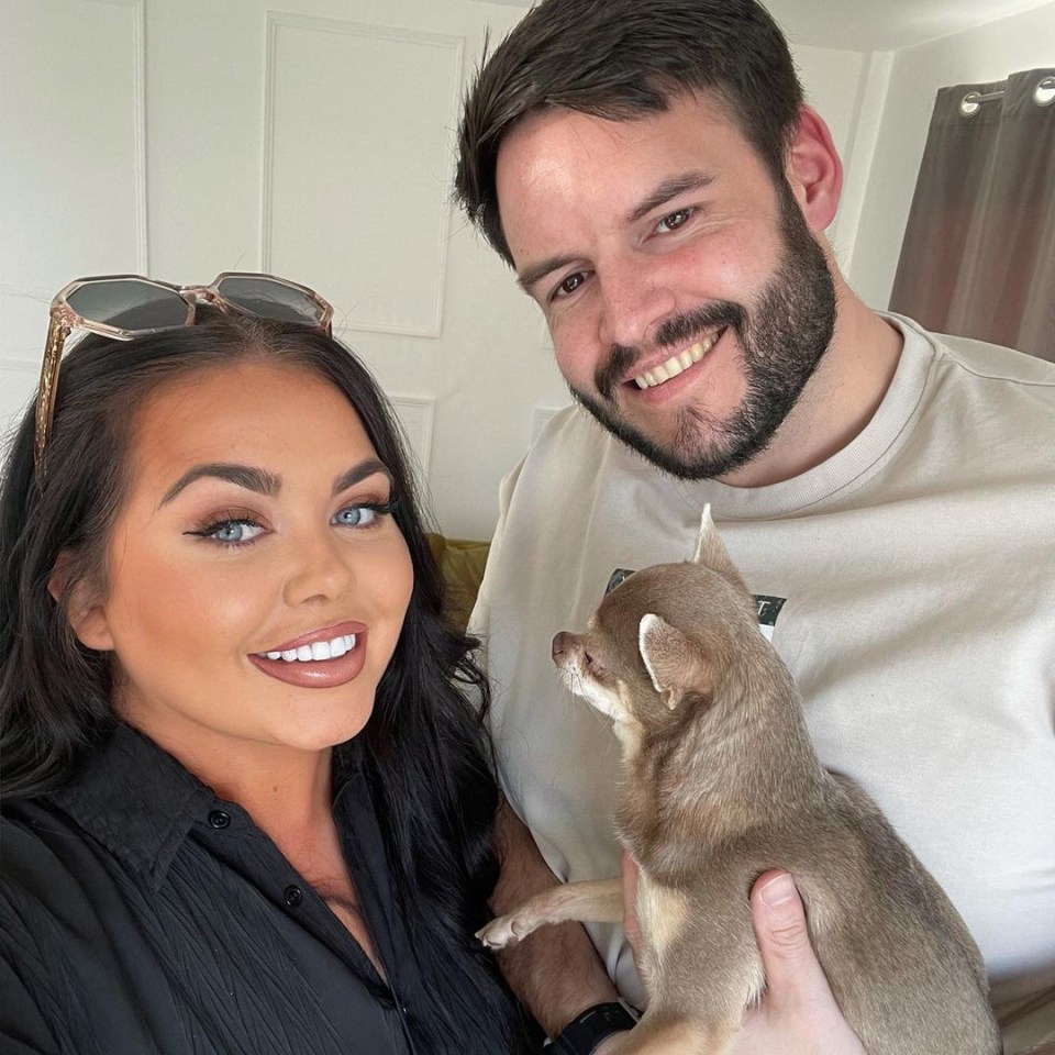 Scarlett Moffatt and her partner with their dog.