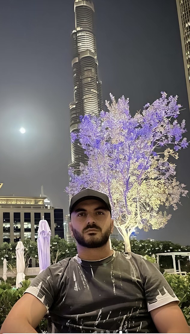 'Vinz' spent time in jail in Albania for the attempted murder of a hotel owner before moving to Dubai. Pictured: 'Vinz' with a view of the Burj Khalifa
