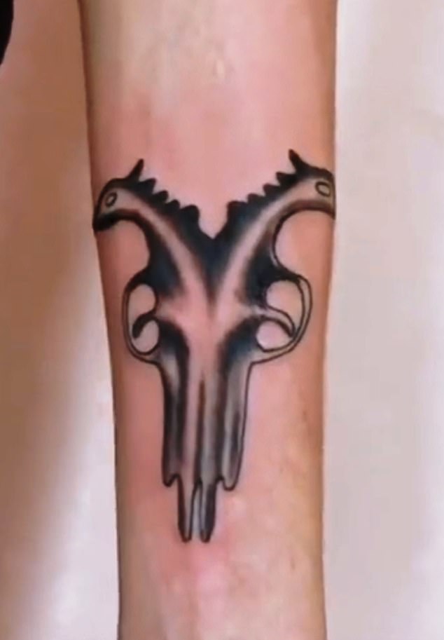The Hellbanianz logo tattoo - a deer skull. Many members have them inked on their body