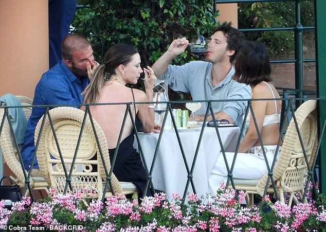 The group were seen enjoying wine, cocktails and food together before heading back to the rest of the family