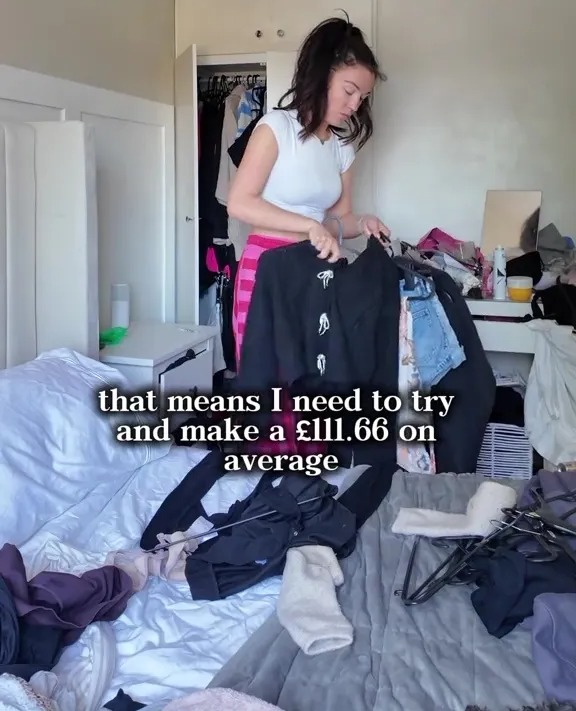 Woman sorting through clothes, seeking funds to avoid eviction.