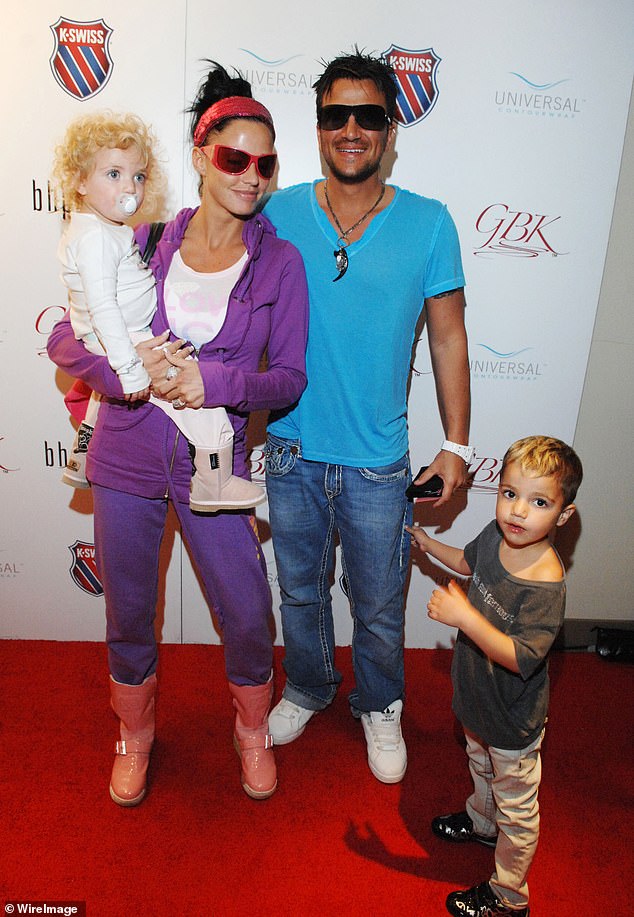 ¿Nothing is private with Katie, it¿s all about keeping herself in the limelight,' said one source. Pictured: Katie Price, Peter Andre, Junior and Princess in 2009