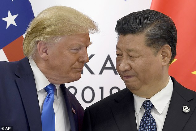 Trump's own admission that Xi has extended a formal invitation suggests momentum is building toward a face-to-face - despite his attempt to cast himself as disinterested. The pair are pictured on the sidelines of the G-20 summit in Osaka, Japan, in June 2019