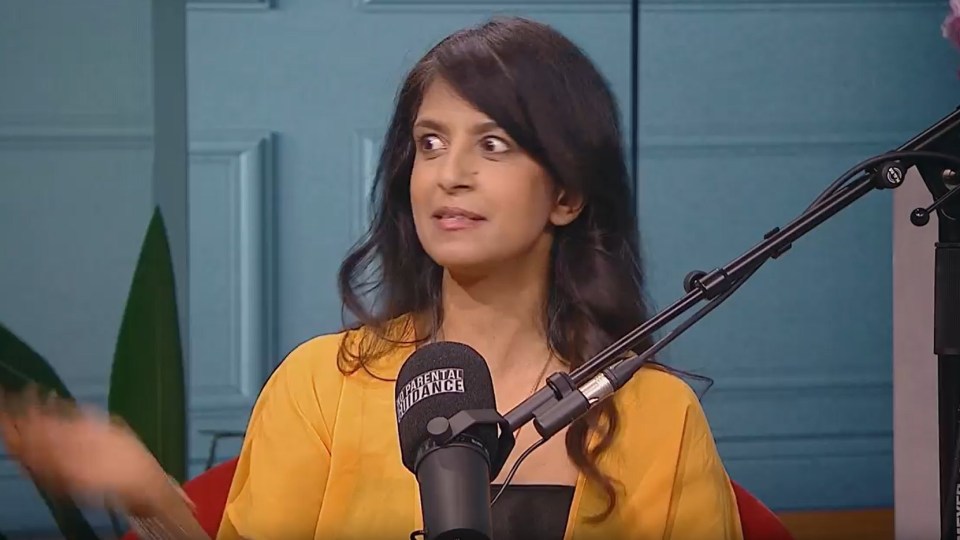 Konnie Huq speaking into a microphone.