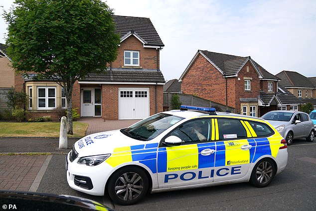 The former politician said: 'Being the subject of a high-profile criminal investigation for almost two years, especially having committed no crime, was like a form of mental torture.' (Police outside Ms Sturgeon's home following her arrest)