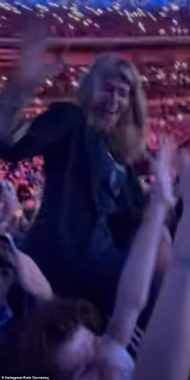 Ina snap shared by Kate, she could be seen sitting on the man's shoulders as she danced to the Gallagher brothers' hits
