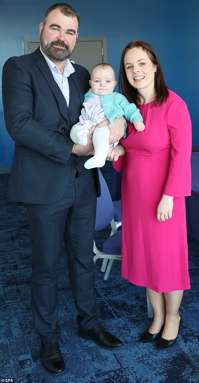 Kate (pictured with husband Alasdair MacLennan and daughter Naomi) will leave politics after next years elections