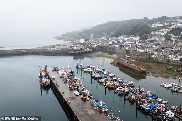 Speaking to the Mail this week, a vagabond living just around the coast from Newlyn said he had watched small boats approaching container ships under the cover of darkness