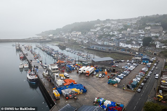 Even when the fog comes rolling in off the sea, the harbour remains busy, with ships and lorries coming in and out all day