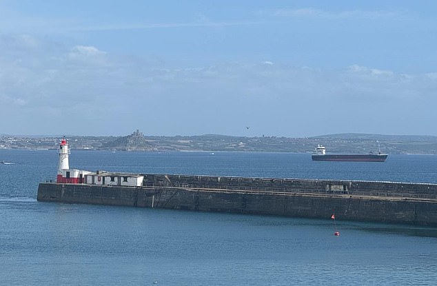 When the sea fog clears, Newlyn Harbour has a view of St Michael's Mount near Penzance