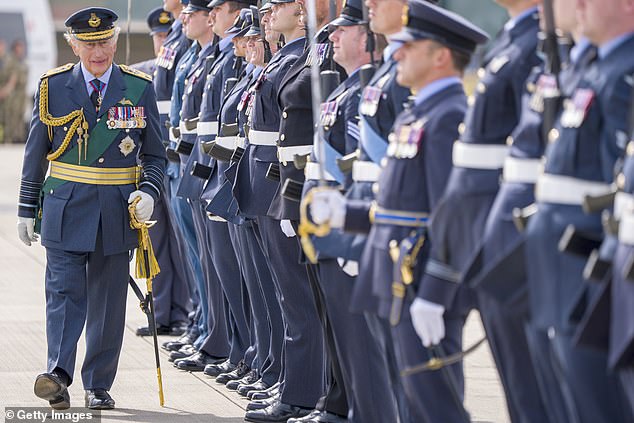 Both come amid the Royal Family's weeks-long annual summer holiday to the Royal Deeside area of Scotland. Pictured: The King inspects members of Number 42 (Torpedo Bomber) Squadron during his visit to RAF Lossiemouth