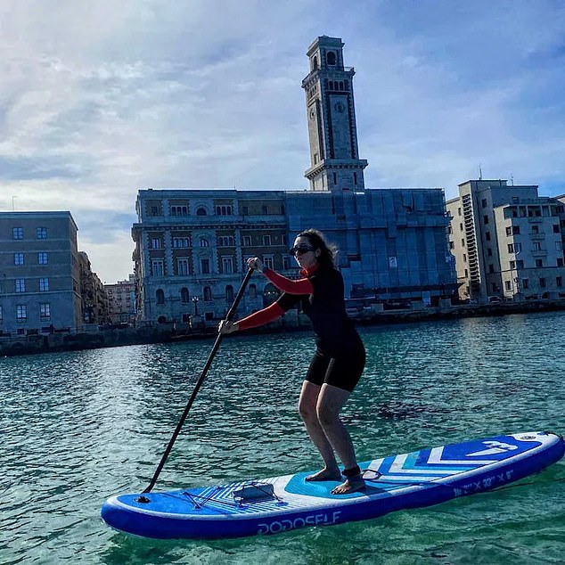 Dari moved to the picturesque town of Bari in the south east of Italy in Puglia, where she can enjoy paddle boarding past the town's historic buildings