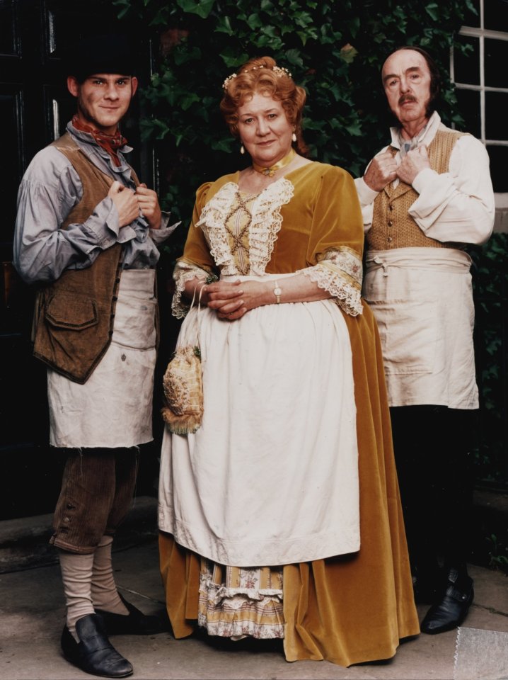 Promotional photo of Patricia Routledge, Derek Benfield, and Dominic Monaghan in period costume for *Hetty Wainthropp Investigates*.