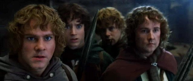 Still image from *The Lord of the Rings*: four hobbits on a journey.