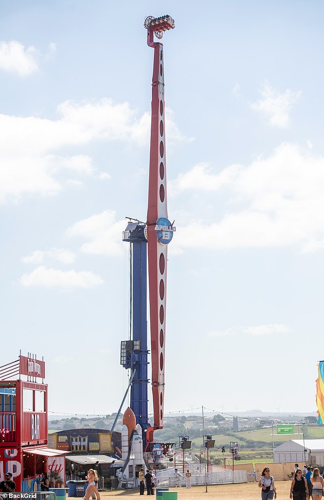 The Apollo 13 attraction takes thrill-seekers to the highest point of the festival in Newquay, Cornwall, swinging riders up towards the sky on a huge arm