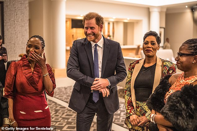 A statement in March said the relationship with Dr Chandauka was 'broken', 'beyond repair' and 'untenable'. Pictured: The pair at a charity event in South Africa last October
