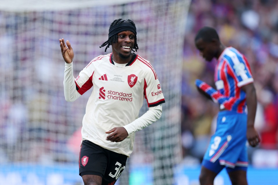 Jeremie Frimpong of Liverpool celebrating a goal.
