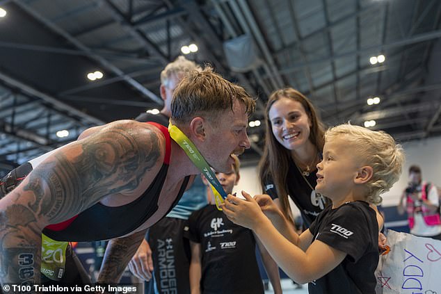 Olympic swimmer Adam, 30, who is set to marry into the Ramsay family, was greeted by his fiance Holly, 25, and his son George, four