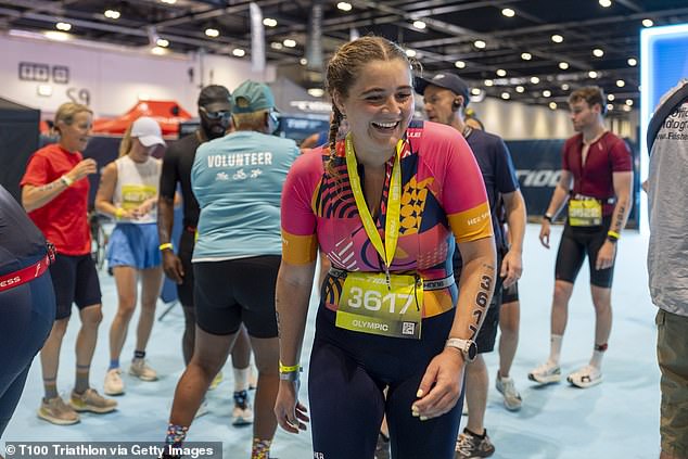 Elsewhere Tilly, 23, looked ecstatic as she celebrated at the finish line and was greeted by Adam's son George after collecting her medal