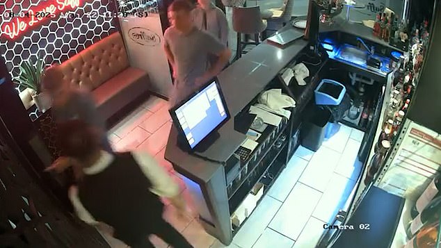 Four men can be seen arriving at the Saffron Restaurant shortly after 10pm on August 4, 2025