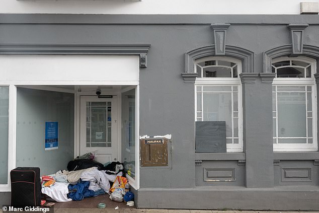 However, running down from Henley Street, where the Birthplace Museum is, sit rows of empty stores that have been taken over by rough sleepers. Pictured: The front of an old Halifax