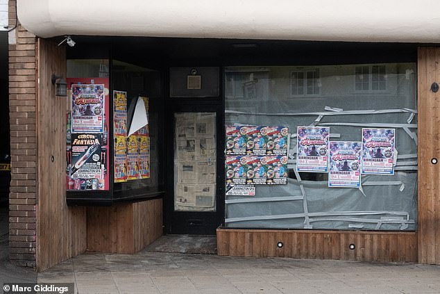 An empty store plastered with posters and newspaper. Locals said the town centre is strugglingRu