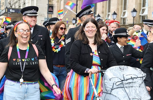 She was pictured at the event with police officers in 2024 wearing facepaint and a rainbow dress