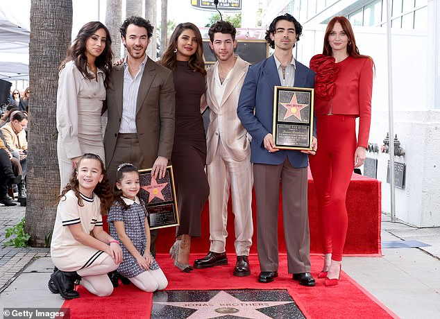 Jonas pictured with Turner and his brothers Nick and Kevin Jonas, alongside their wives  Danielle Jonas and Priyanka Chopra