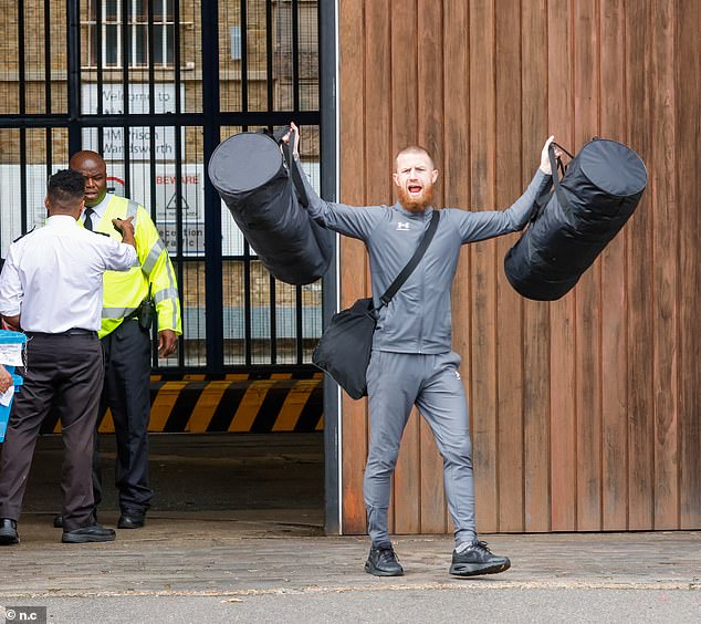 On the first day of Labour¿s scheme last September, lags released early were seen celebrating outside jails. Pictured: a man celebrates as he is released from HMP Wandsworth