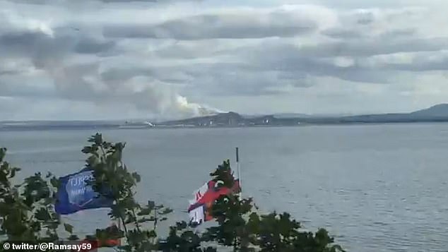 The fire at Holyrood Park in Edinburgh seen from East Fife earlier on Sunday