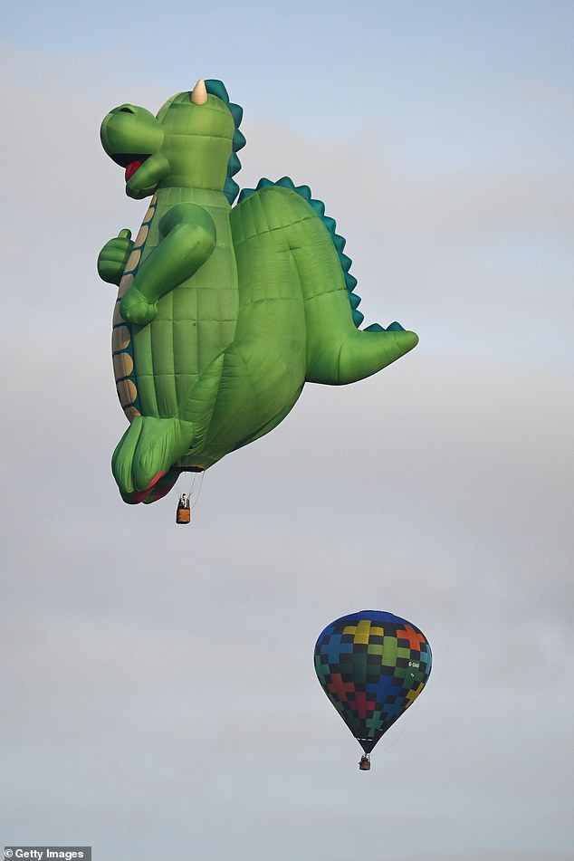 Some compared him to Godzilla or 'The Muncher' monster from the 1980s adverts for Chewits sweets. Regardless, Oggy has been a big hit in Bristol today, with dozens of people snapping photos of him in the sky