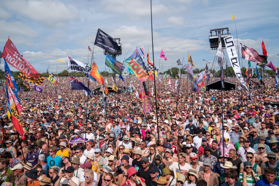 Large crowd at a music festival.