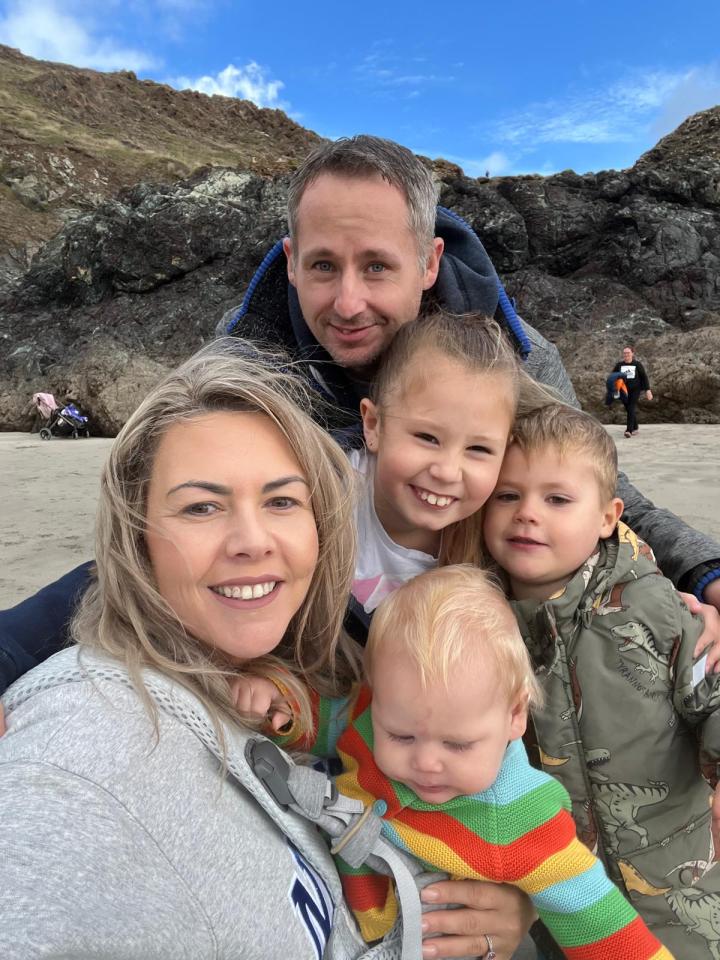 Family photo on a beach.