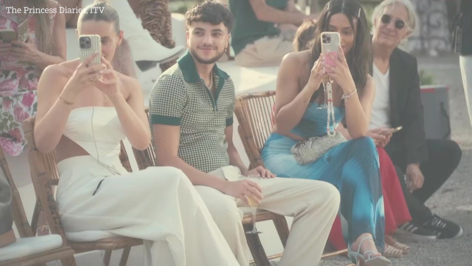 People watching a fashion show in Ibiza.
