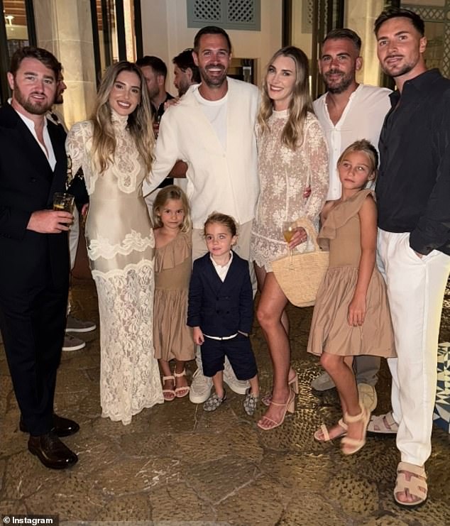 Tia stunned in a champagne lace dress that hugged every inch of her jaw-dropping figure, while groom Harry chose a classic suit