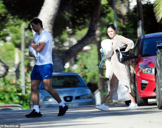 They also didn't announce Rafa's birth, though the sportsman had confirmed she was pregnant a few months beforehand (pictured with baby son Rafa in 2022)