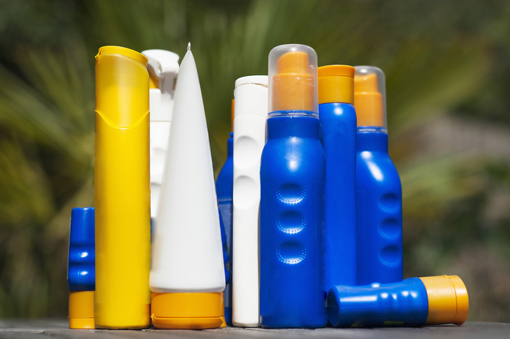 Bottles and tubes of sunscreen.