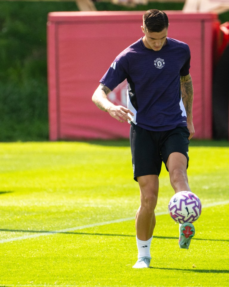 Benjamin Sesko of Manchester United juggling a soccer ball during training.