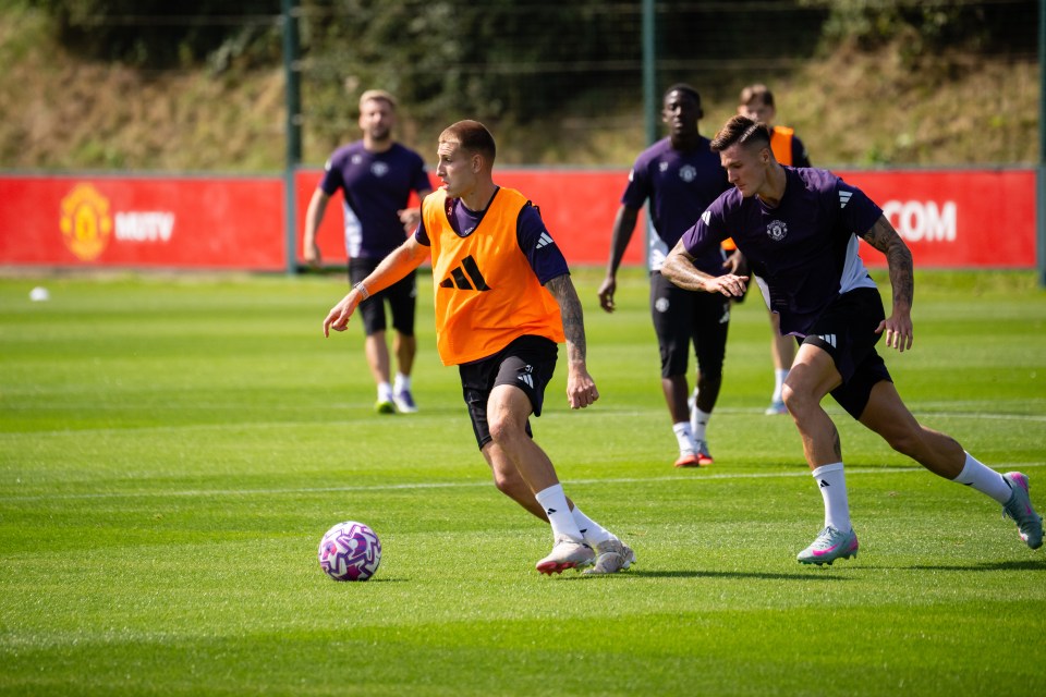 Rhys Bennett and Benjamin Sesko of Manchester United in a training session.