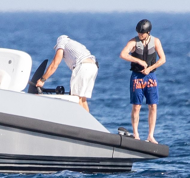 Another crew member was on hand before Cruz showcased his surfing skills